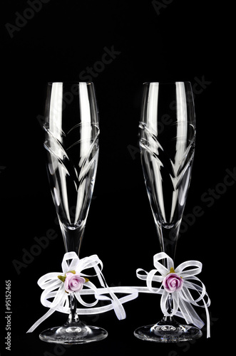 Two decorated Wedding glasses on black isolated