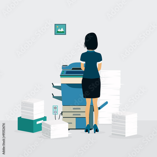 Female employees are copying documents with the copier.
