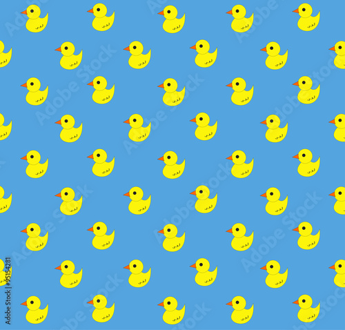 Yellow rubber duck pattern on blue background