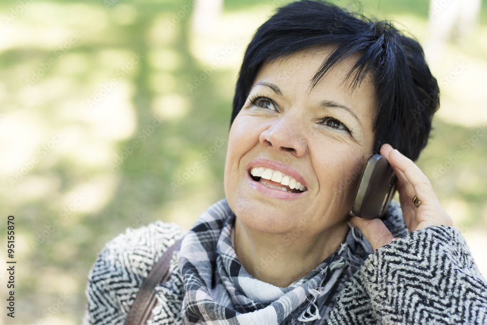 Senior woman using new technology devices Senior woman using new technology devices