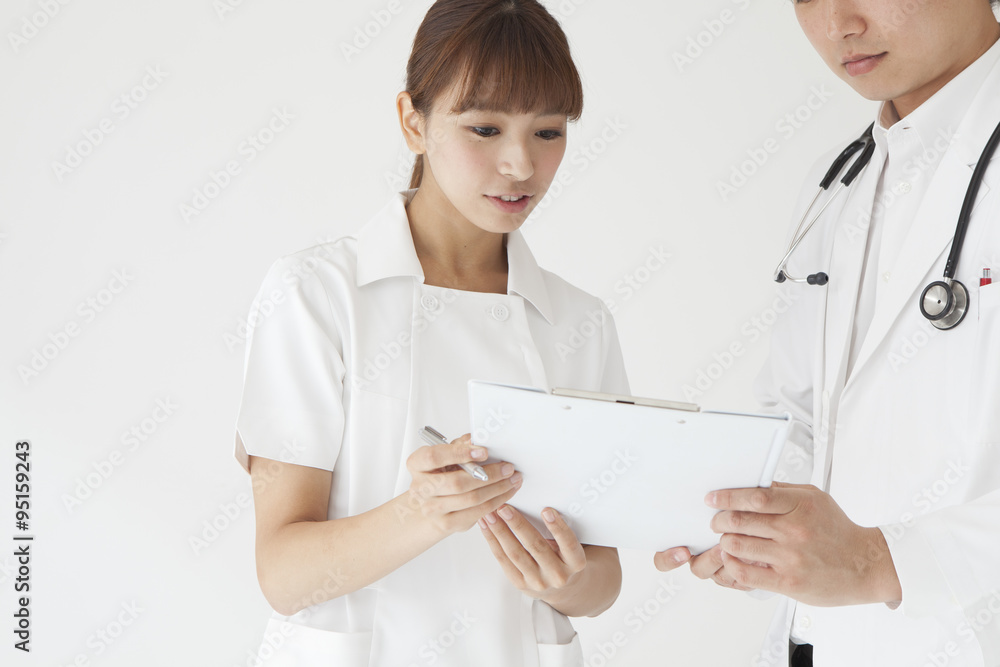 Doctors and nurses are looking at medical records Doctors and nurses are looking at medical records