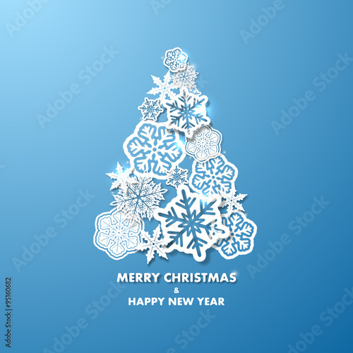 New year background with Christmas tree made of paper snowflakes