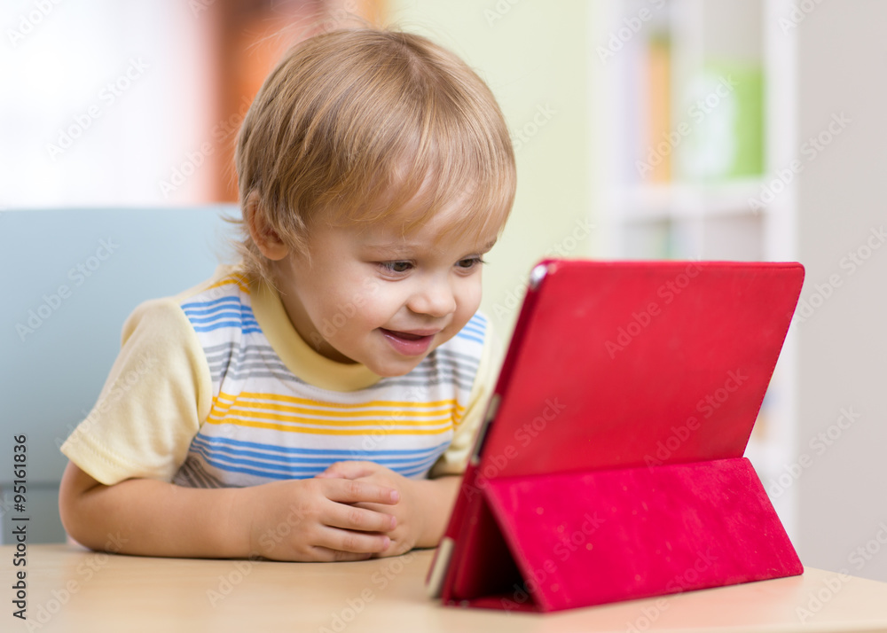 Cute kid toddler boy with tablet pc Cute kid toddler boy with tablet pc