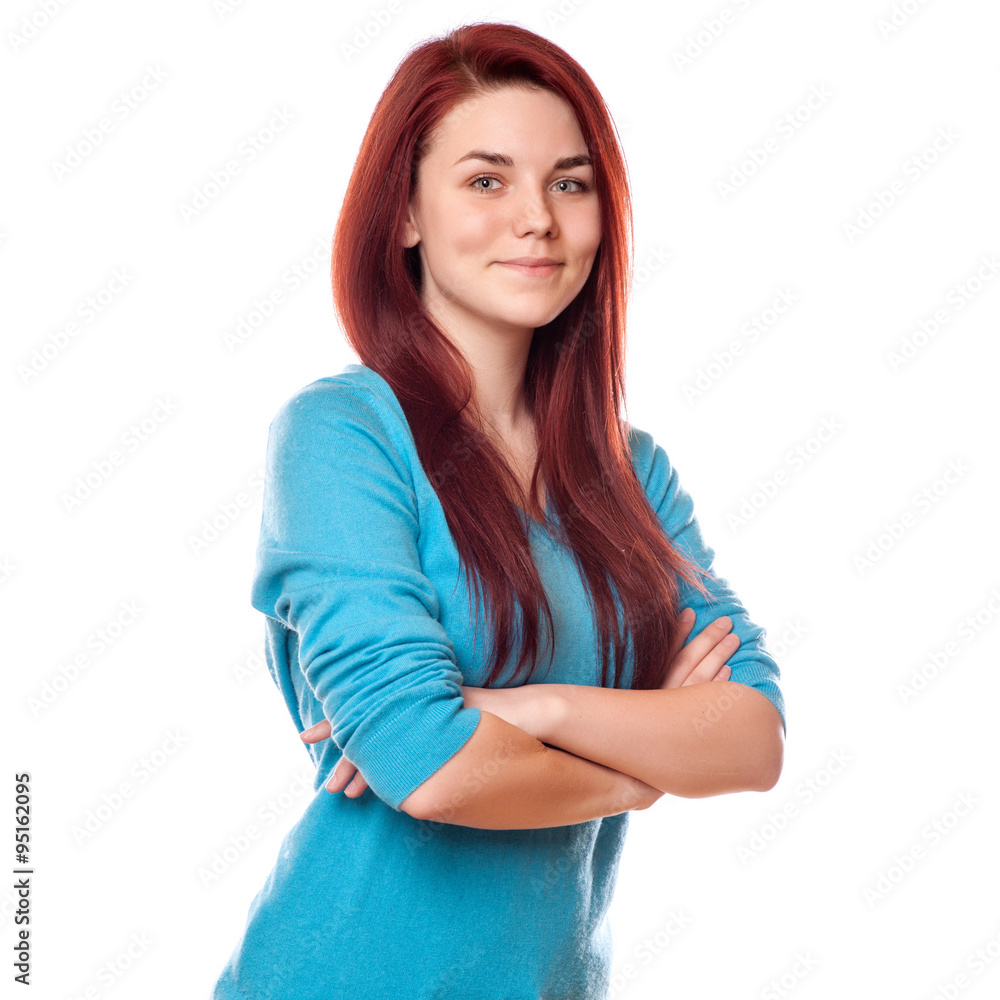 Young smiling beautiful girl in a blue sweater on a white background Young smiling beautiful girl in a blue sweater on a white background