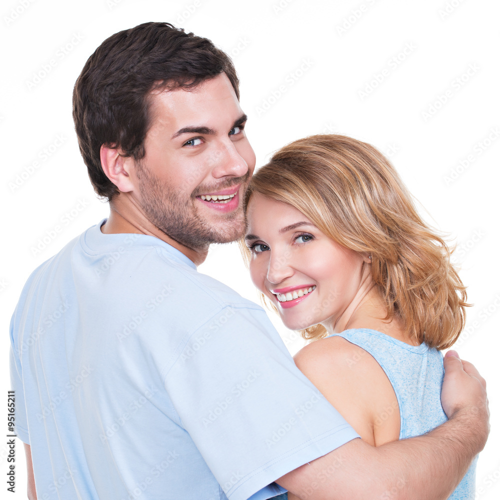 Back view of young couple in embrace. Back view of young couple in embrace.