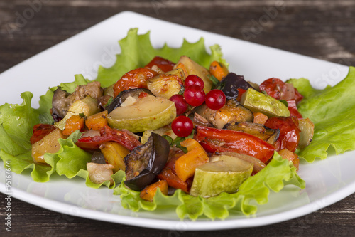 Roasted vegetables on a white plate