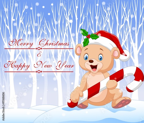 Cartoon funny baby bear holding Christmas candy with winter background