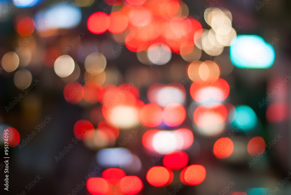 Traffic in Night City. Blurred Defocused Multi Color Lights