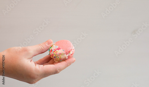 Chocolate Dipped Pink Macaroons with Berries Buttercream and Sprinkles