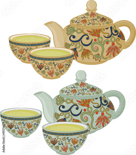 The teapot and small cups of Chinese green tea. Set of isolated objects.