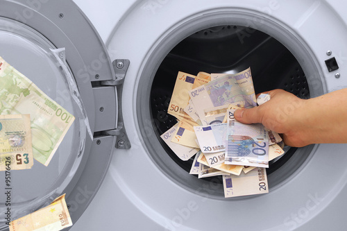 money laundering illegal cash euros and pounds photo