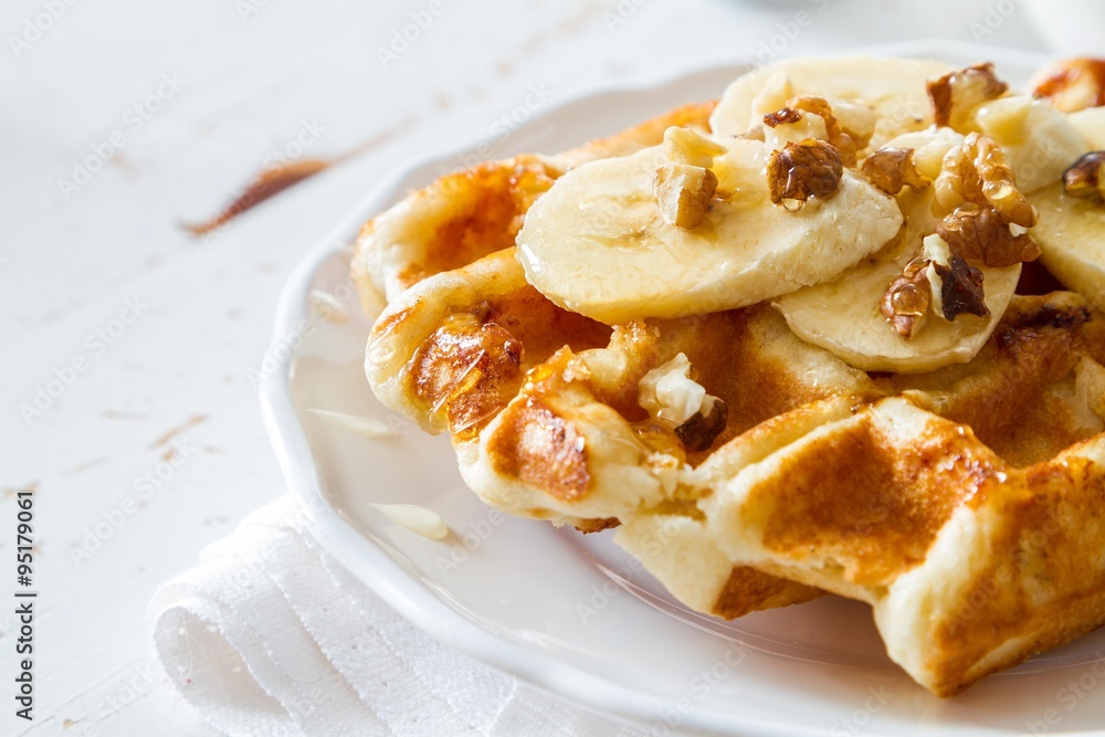 Waffles with banana and nuts honey