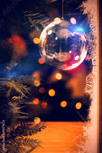 Composite image of christmas bauble