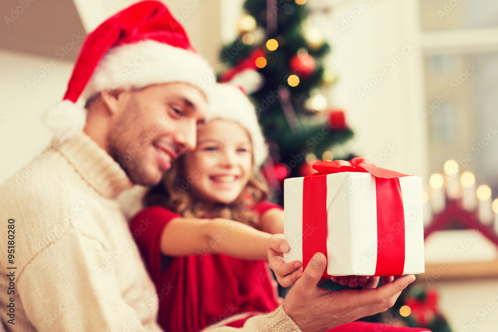 close up of father and daughter with gift box close up of father and daughter with gift box