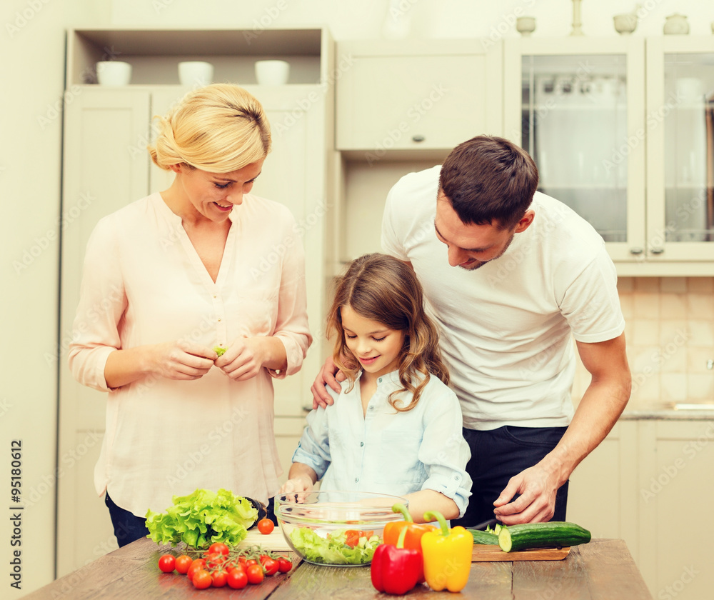 happy family making dinner in kitchen happy family making dinner in kitchen