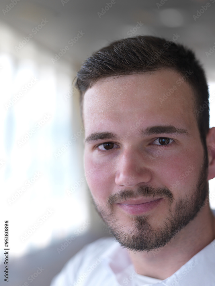 Obraz premium portrait of young business man with beard at modern office