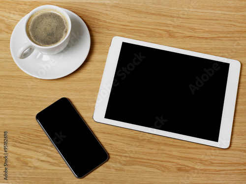 Tablet, mobile phone and coffee