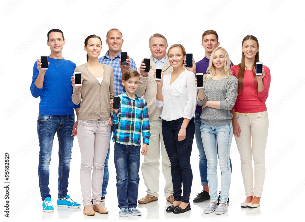Fototapeta premium group of smiling people with smartphones