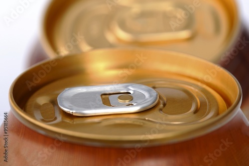 Closed aluminum can with a drink, closeup, shallow DOF