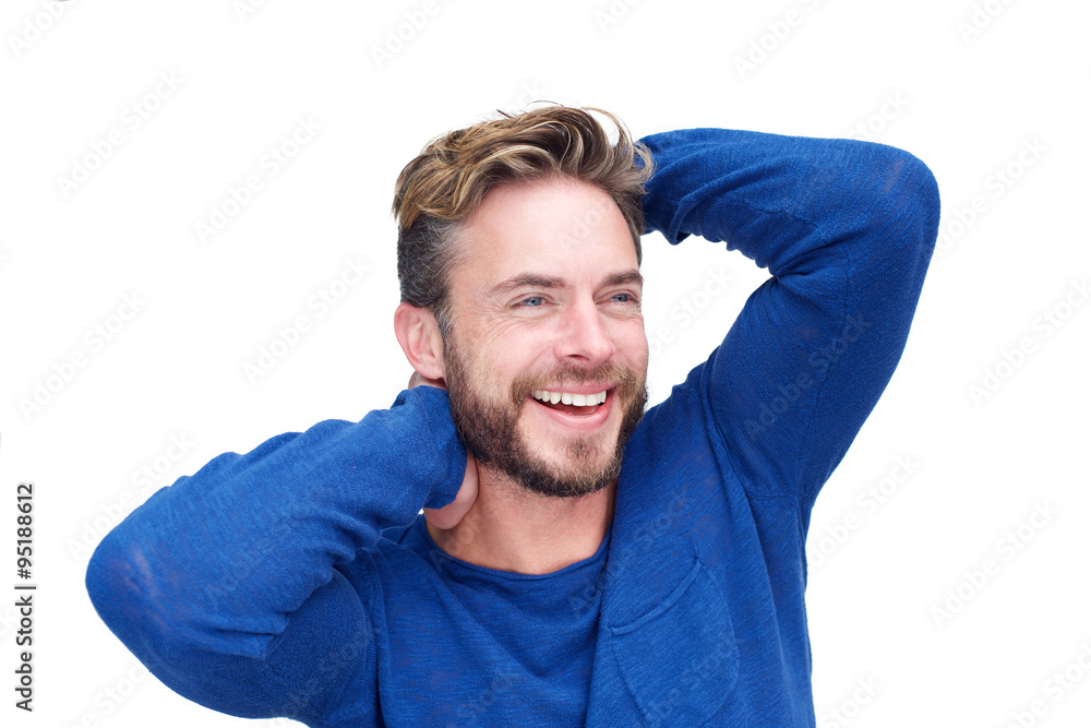 Male fashion model laughing with hand in hair Male fashion model laughing with hand in hair