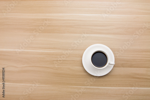 Coffee cup on the desk