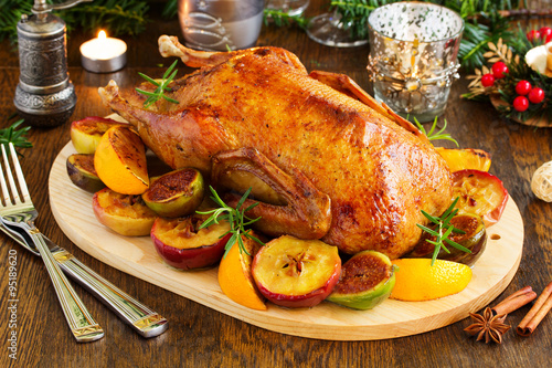 Festive Christmas duck baked with apples and figs.