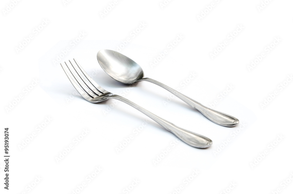 silver spoon and fork isolated in white background silver spoon and fork isolated in white background