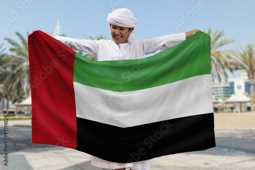 Boy Holding Flag