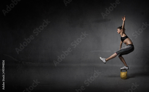 balance on a kettlebell