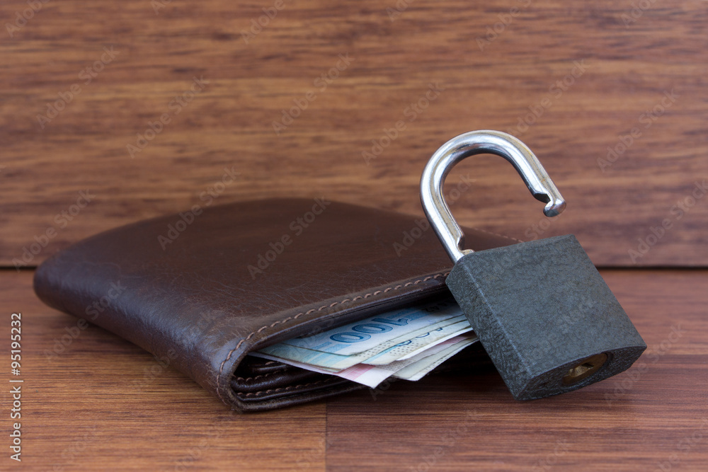 Unlocked padlock,wallet and money Unlocked padlock,wallet and money