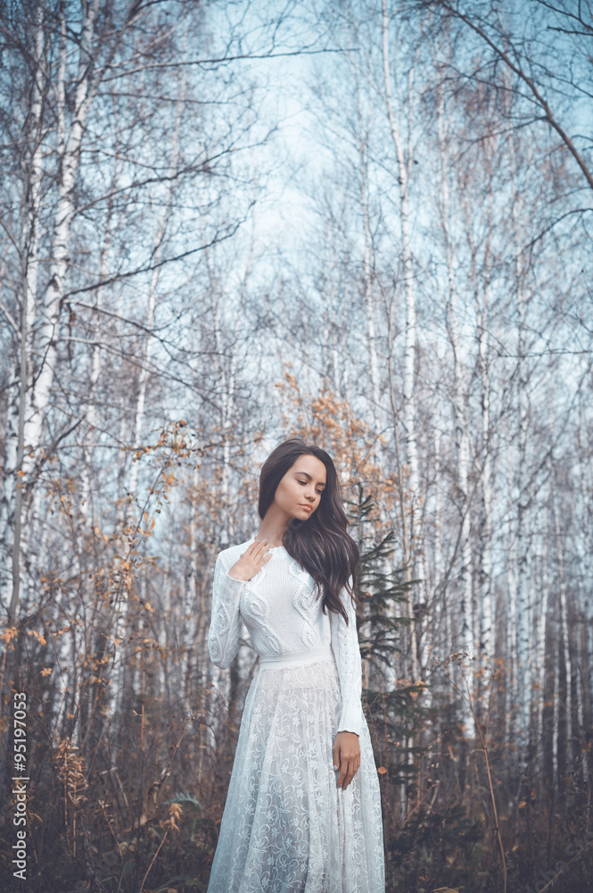 Beautiful lady in a birch forest Beautiful lady in a birch forest
