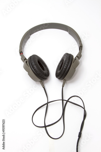Black pair of vintage headphones on a White Background