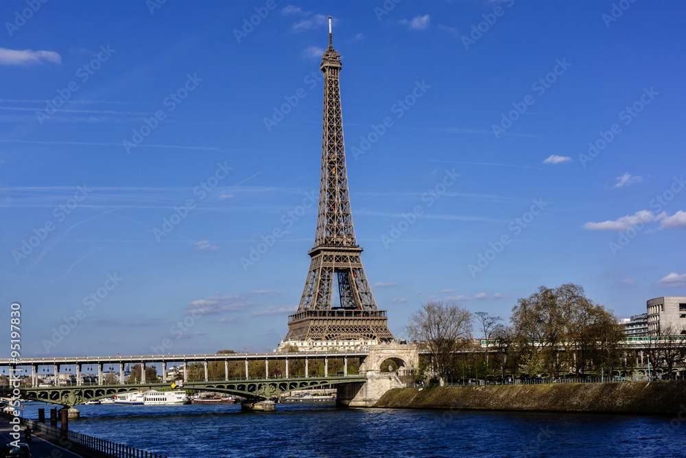 River Seine Embankment with Eiffel Tower (La Tour Eiffel). Paris
