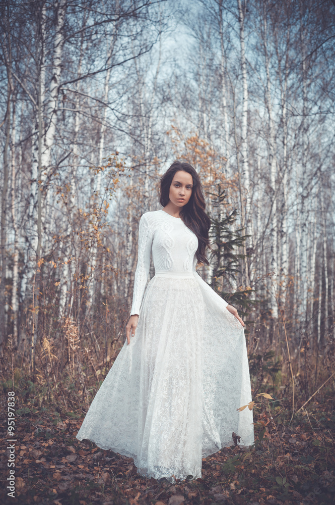 Beautiful lady in a birch forest Beautiful lady in a birch forest