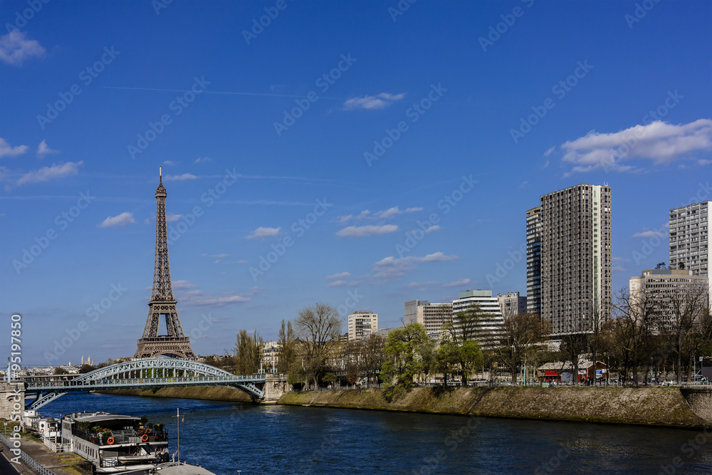 River Seine Embankment with Eiffel Tower (La Tour Eiffel). Paris