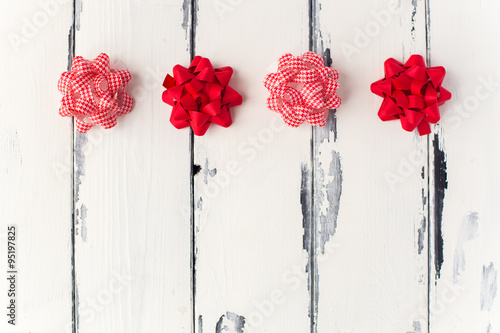 gifts bown in a row, background photo