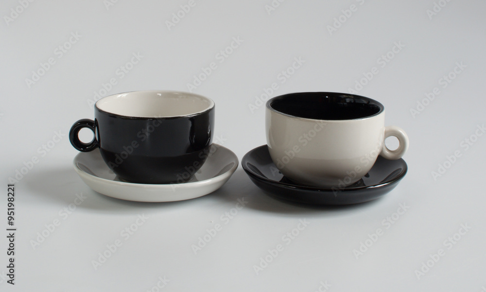 Black and white small cups