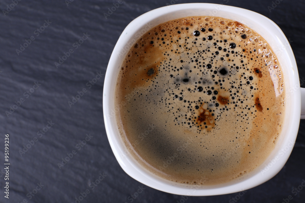 Cup of coffee on table close up Cup of coffee on table close up