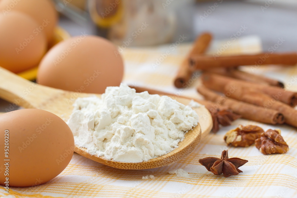 Dough preparation. Baking ingredients: eggs, flour and spices.