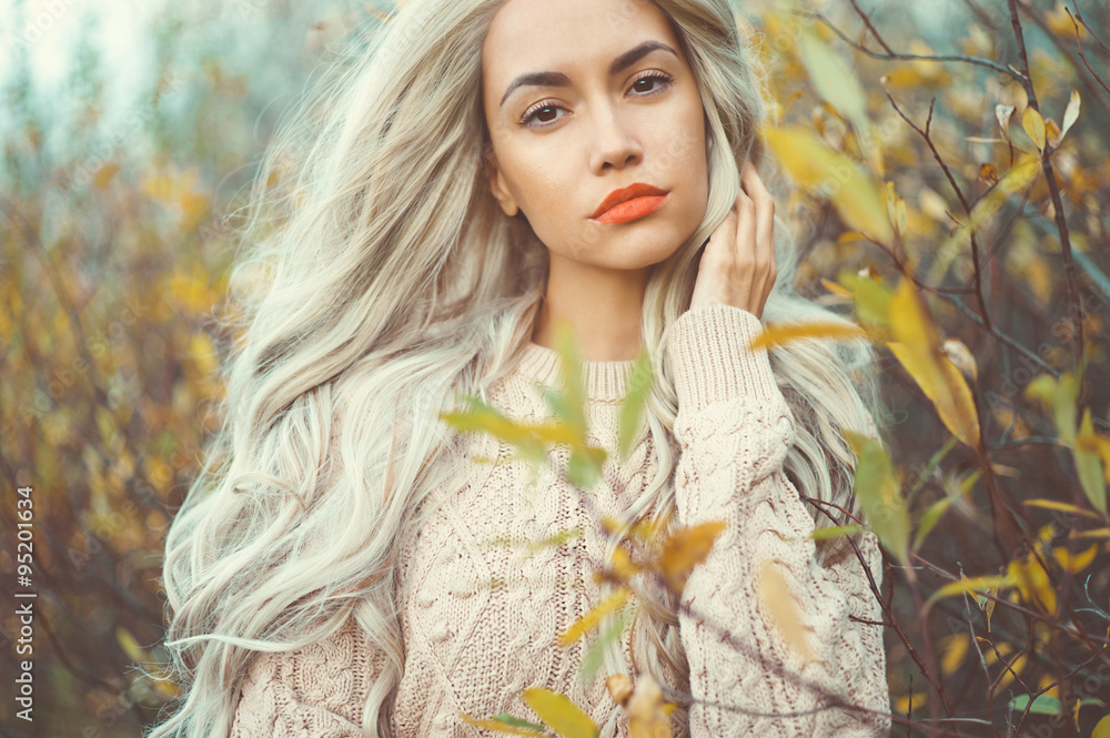 Beautiful lady surrounded autumn leaves Beautiful lady surrounded autumn leaves