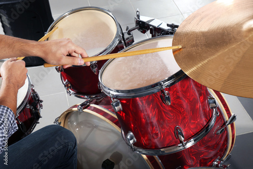 Musician playing the drums closeup