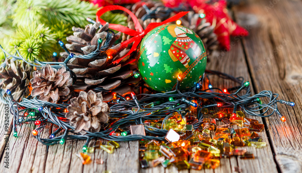 Naklejka premium Christmas decoration with pine and cones