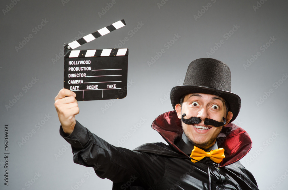 Funny man with movie clapboard Funny man with movie clapboard