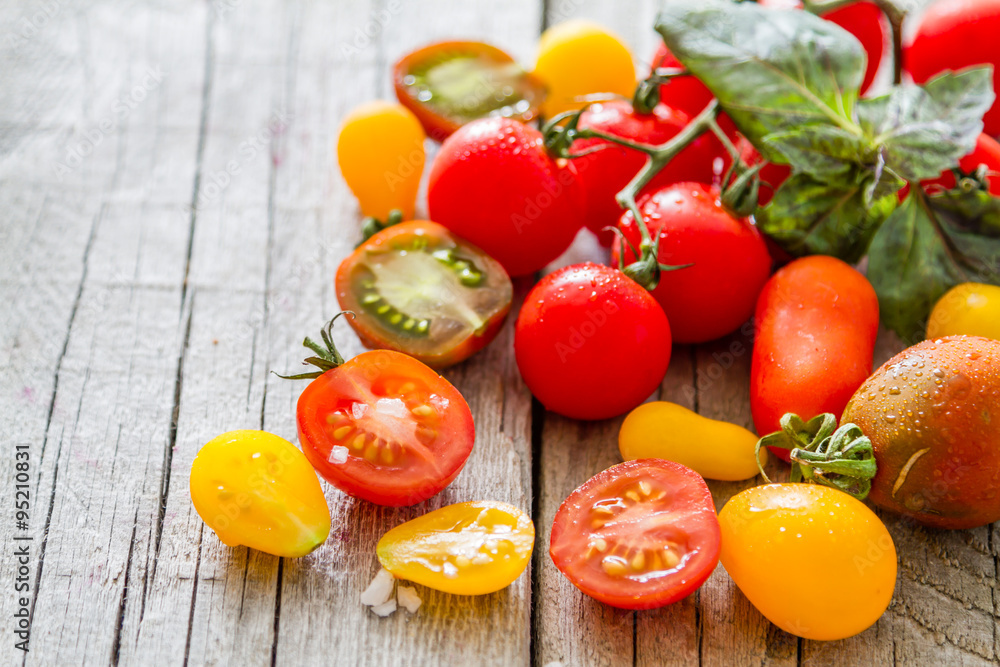 Colorful tomatoes, basil Colorful tomatoes, basil