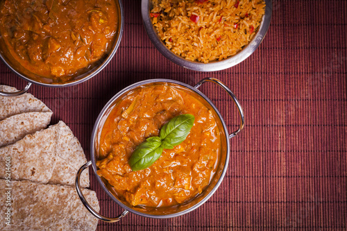 Chicken Tikka Masala Curry on Rattan Background