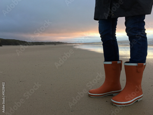 Wellington boots on the beach