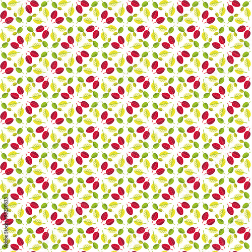 geometric seamless pattern of green, yellow and red leaves