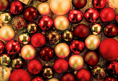 Background of colored Christmas tree balls and decorations retro filtered