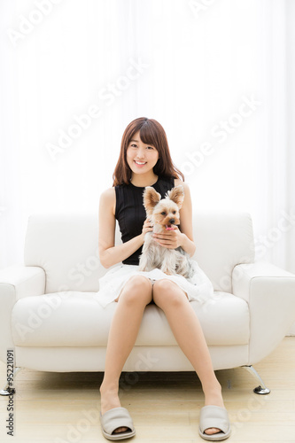 young asian woman with dog