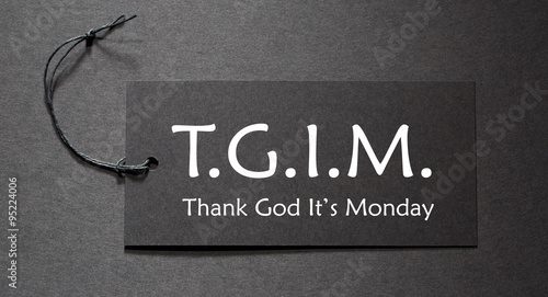 TGIM text on a black tag photo